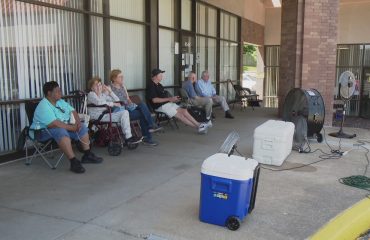 St. Louis County seniors wait outside in high heat for property tax freeze help